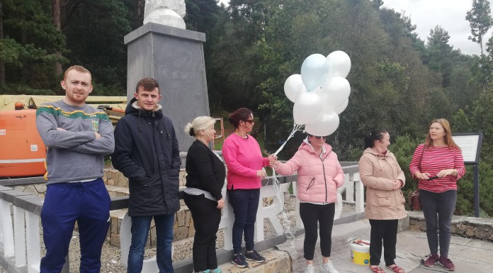 Members of Tipperary Rural Traveller Project release balloons in memory of those who died by suicide