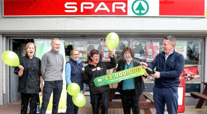 Michael O'Brien, Owner of Spar in Borrisokane, is pictured celebrating with staff as his store was revealed as the winning location for last Saturday’s 2pm Daily Millions  top prize ticket worth €1,000,000. Photography: MacInnes Photography.