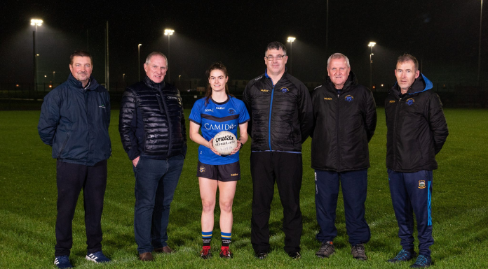 L-R Tommy Sheehan, Pitch Manager – Fethard Town Park; Maurice Moloney, Director – Fethard Town Park; Maria Curley, Captain Tipperary Ladies Football; Micheal Towey, Chair Tipperary LGFA; Tony Smith, Selector; John Hickey. Photo from FethardTownPark.ie via Canva.com.