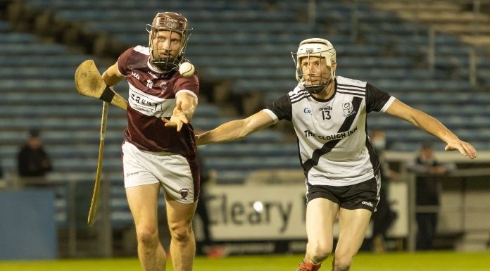 Kilruane's Conor Cleary in pursuit of Borrisileigh's Paddy Stapleton. (c) Sportsfocus.ie via canva.com.