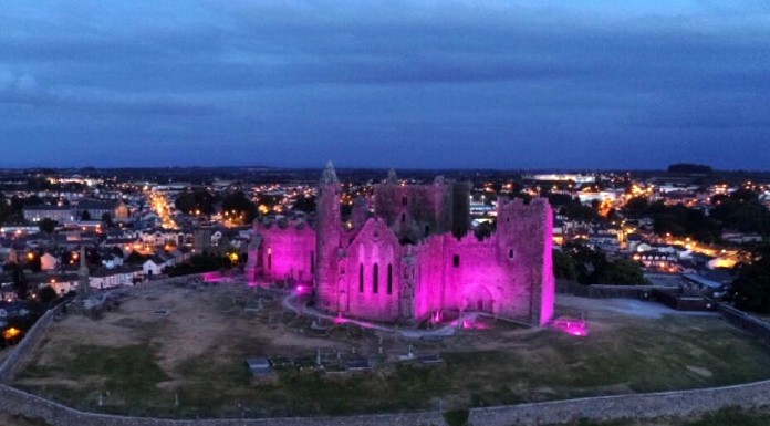 The Rock of Cashel, lit up in pink, as part of an annual fundraising Play in Pink event at Dundrum House Golf Club.